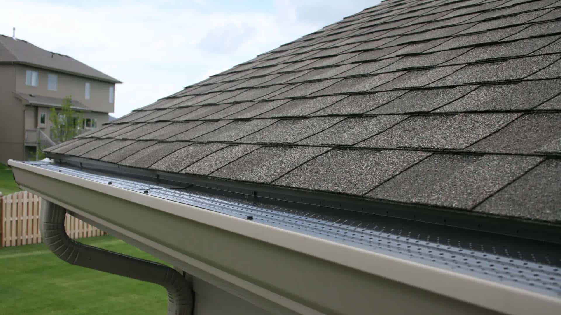 Gutter with gutter guards installed by lincoln, nebraska roofing company
