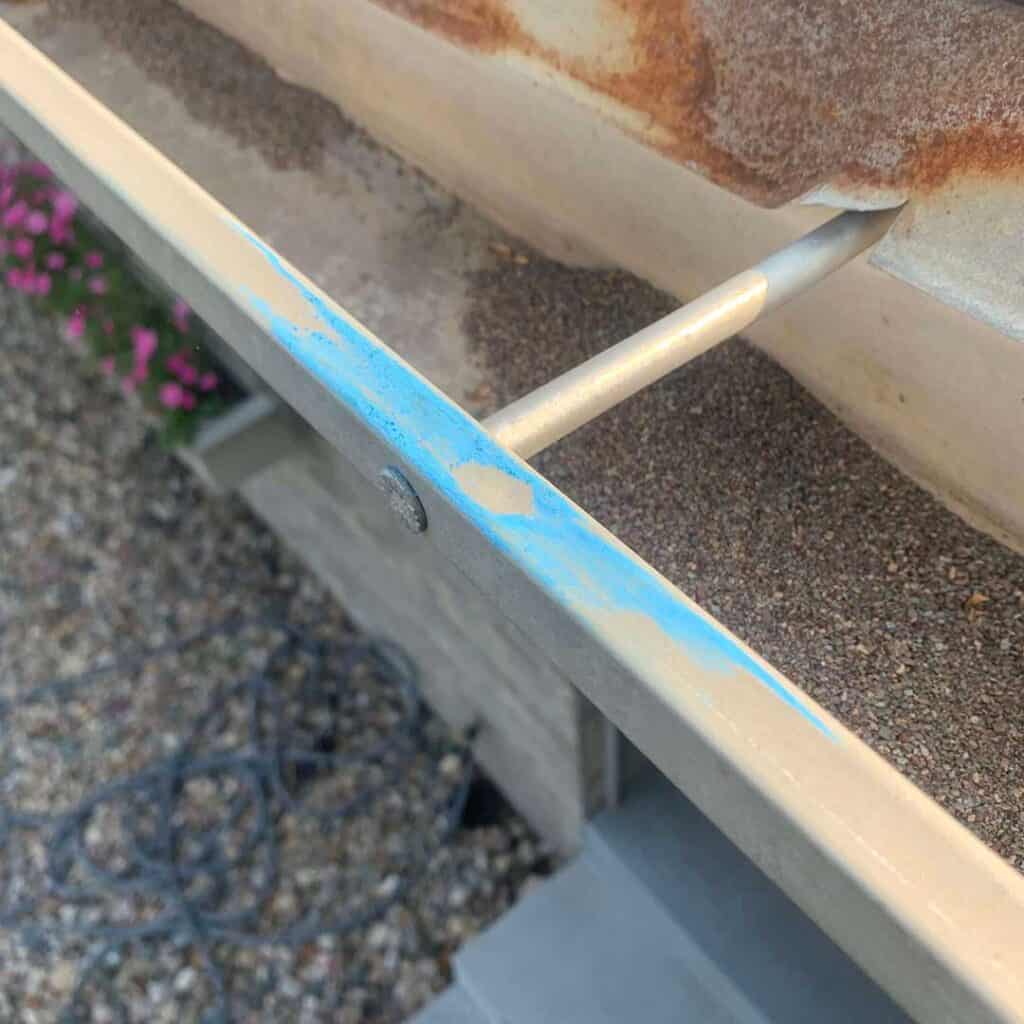Hail damage to a gutter in Omaha from an Omaha Hail storm
