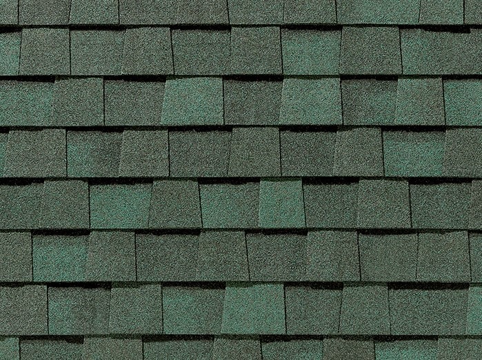 Close up shot of Green asphalt roof shingles for Omaha roofing company