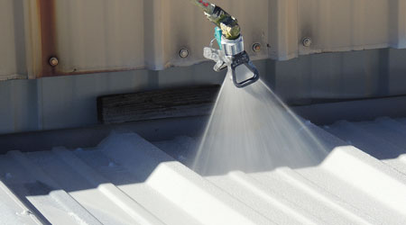 A Sprayer coating a roof in omaha