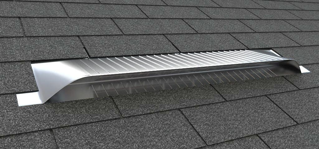 A roof vent on a shingle roof.