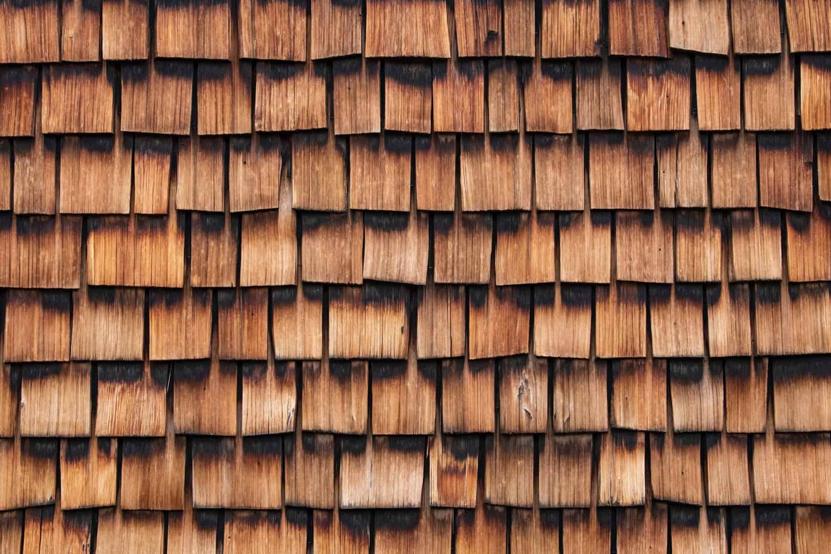 Closeup image of a cedar shake shingle roof installed by a professional Omaha roofing contractor.