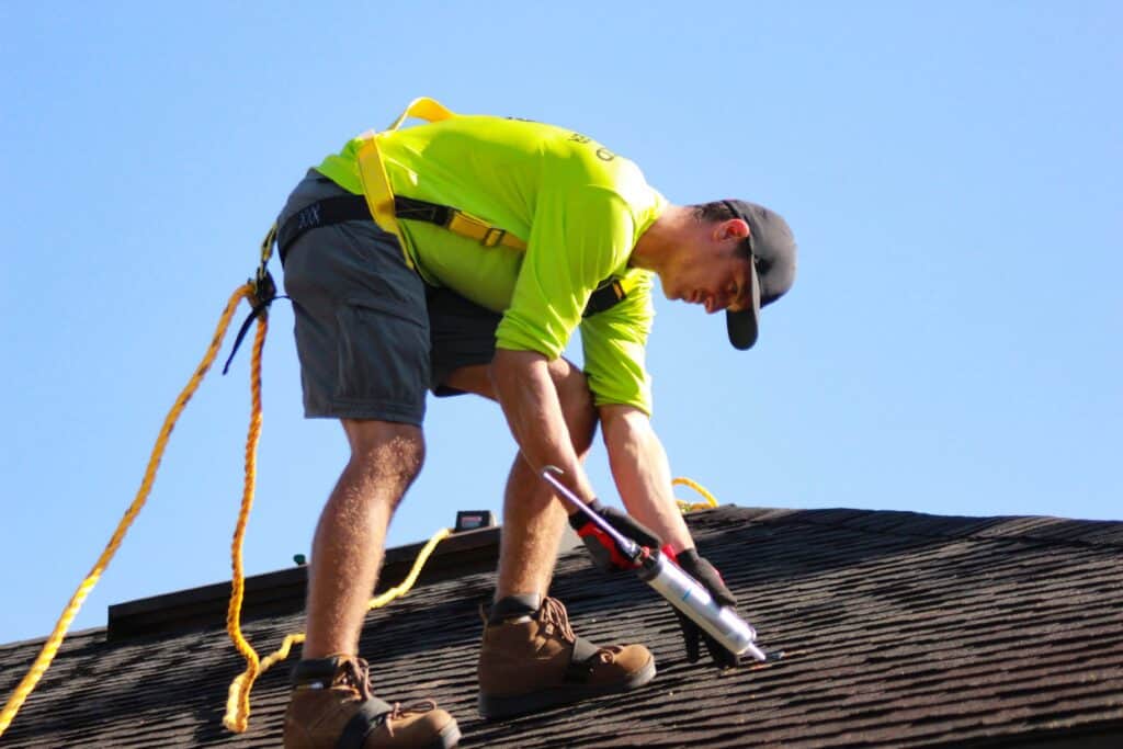 A professional Omaha roofer installing a new roof.