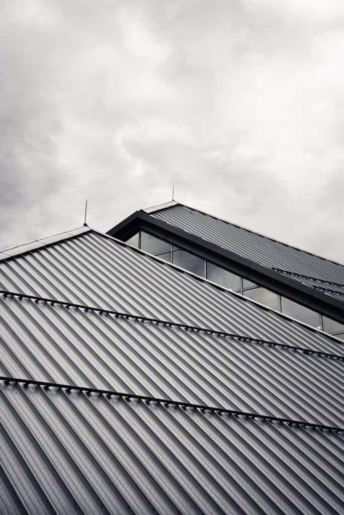 A black and white image of the metal roof of an Omaha home.