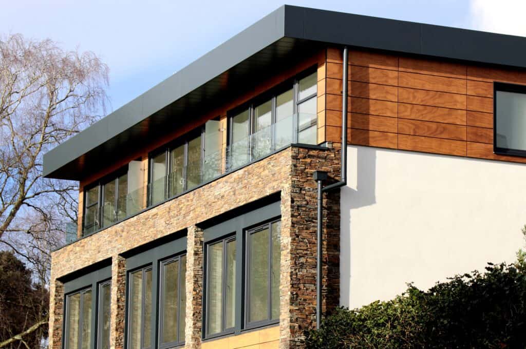 A modern Omaha home with composite siding and a flat roof.